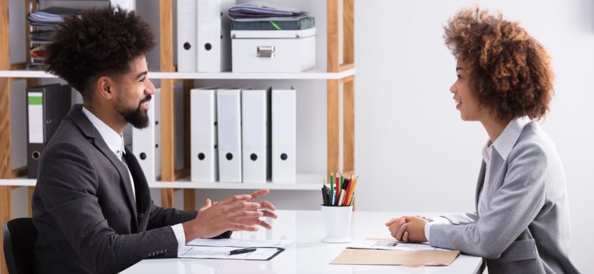two people discussing work opportunities